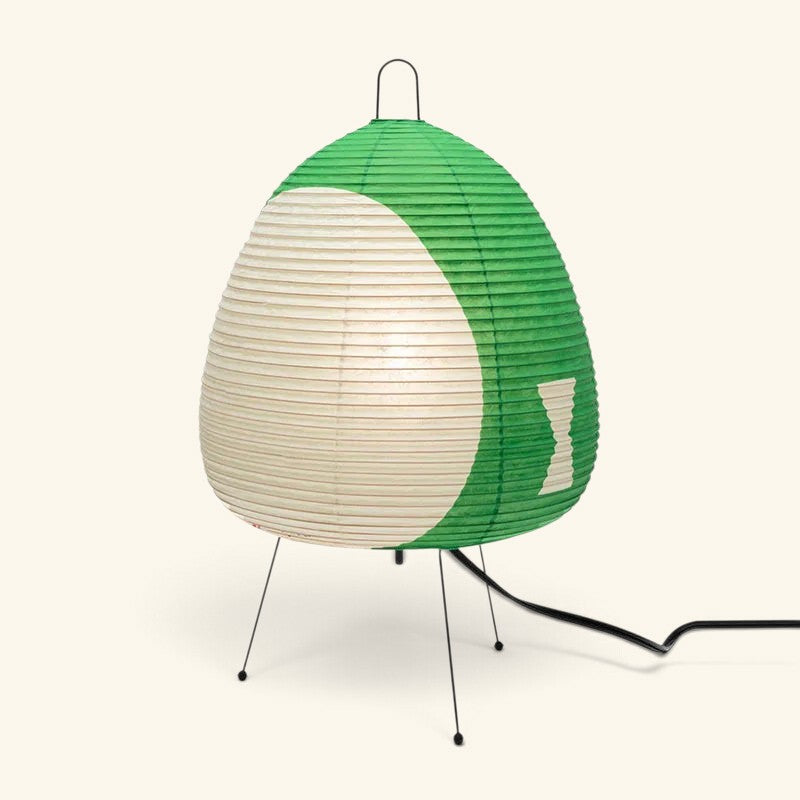 Lampe Maison Lumari style Akari en papier de riz vert et blanc avec abat-jour ovale et pied trépied en métal noir